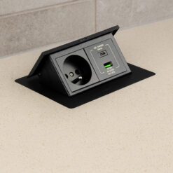 a black rectangular object with a power cord