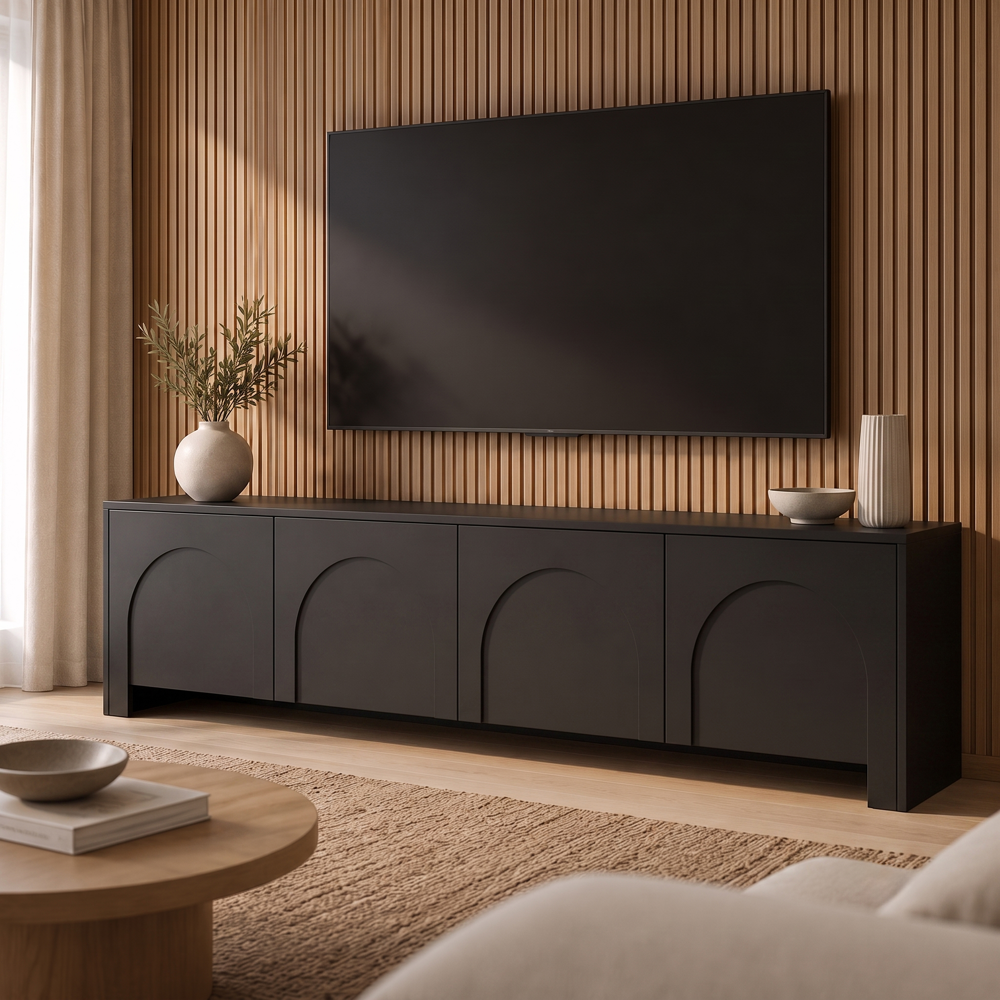 Detailaufnahme des Push-to-Open-Systems im schwarzen TV-Board Vento.